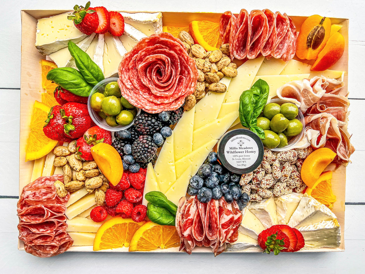 The Cheese + Charcuterie Boards St. Louis Cheese Boards, LLC